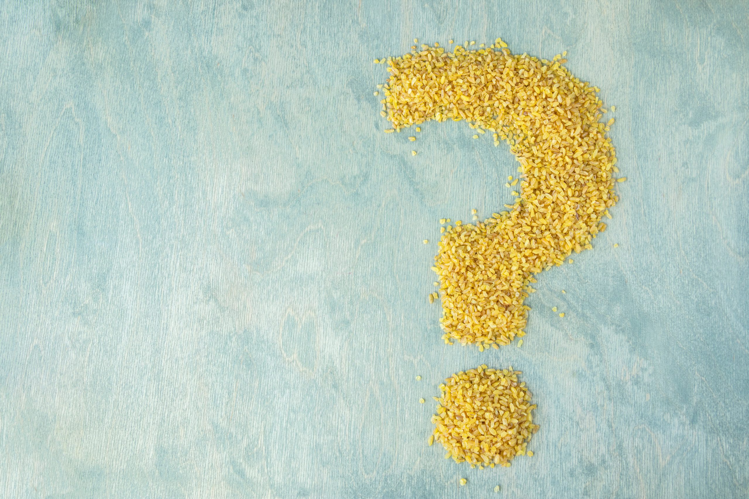 Question mark made of bulk materials