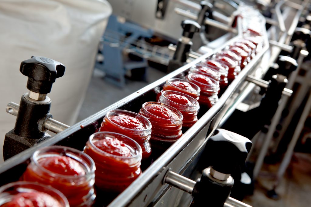 Ketchup in a factory getting packaged