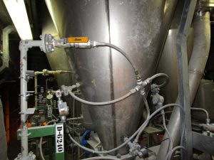 AirSweep on an additive surge bin processing vessel